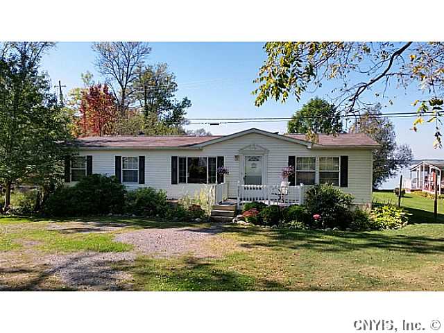 Photo of 5035 Kozy Kove Rd, Springport, NY 13034 (MLS # S320634)